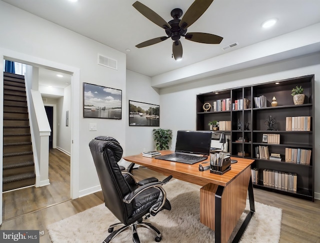 office area featuring hardwood / wood-style flooring and ceiling fan