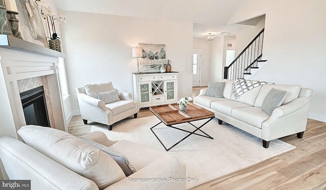 living room with light hardwood / wood-style floors