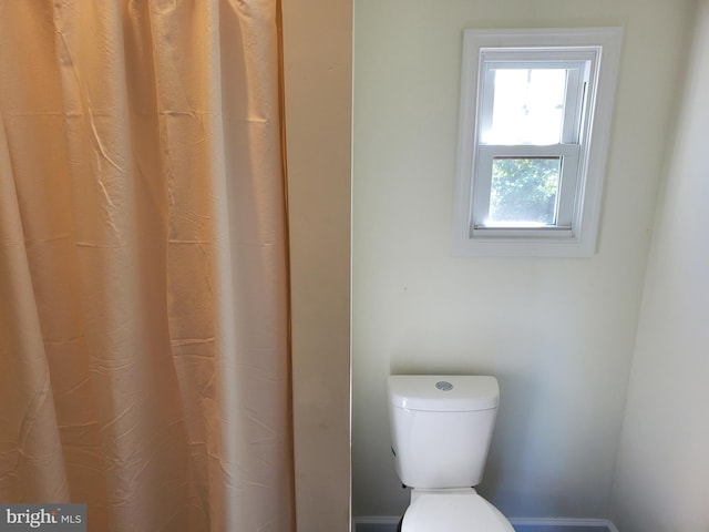 bathroom featuring toilet