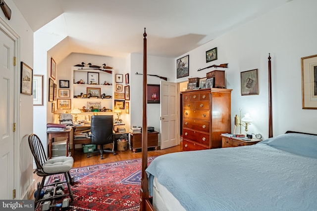 bedroom featuring wood finished floors