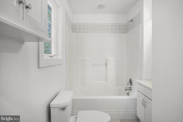 full bathroom featuring toilet, shower / bathtub combination, and vanity