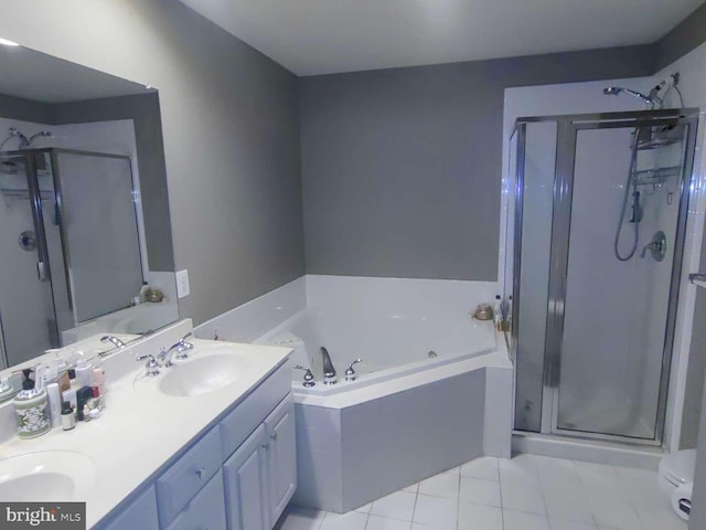 full bathroom with plus walk in shower, tile patterned floors, toilet, and vanity