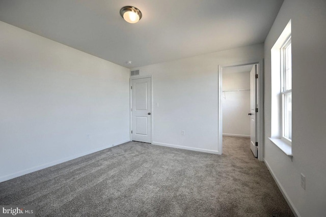 empty room with carpet flooring