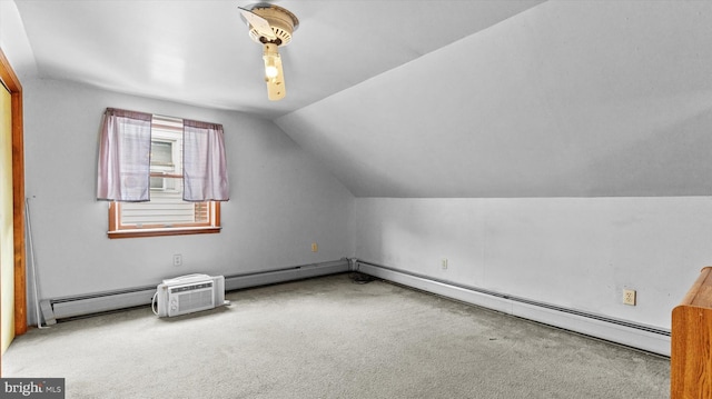 bonus room with lofted ceiling, baseboard heating, and carpet floors