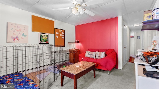 interior space featuring ceiling fan