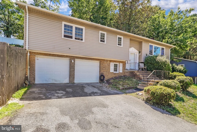 split foyer home featuring a garage