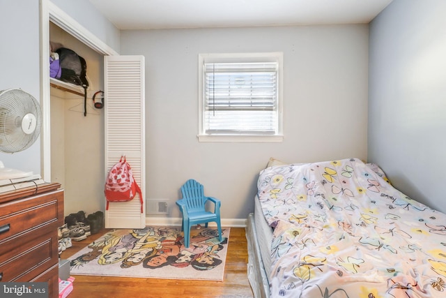 bedroom with light hardwood / wood-style flooring