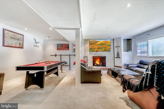 playroom with light colored carpet, a fireplace, and billiards