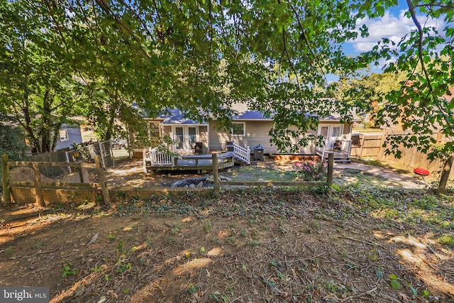 view of yard with a wooden deck