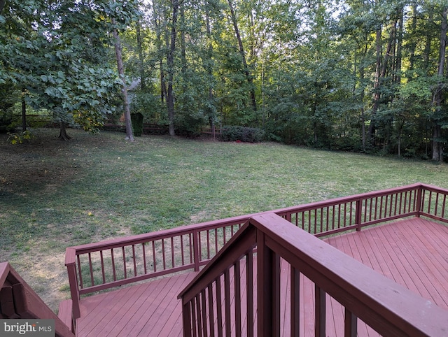 deck featuring a lawn