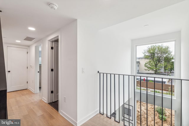 hallway featuring light hardwood / wood-style flooring