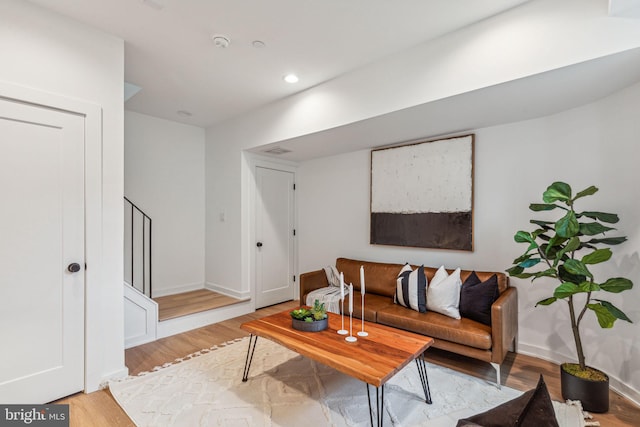 living room with light hardwood / wood-style floors