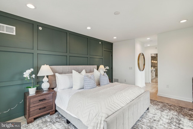 bedroom featuring light wood-type flooring