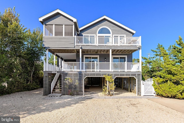 coastal inspired home with covered porch