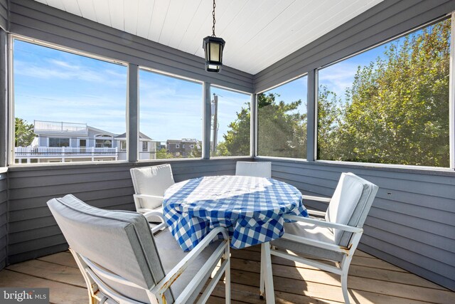 sunroom / solarium with a healthy amount of sunlight