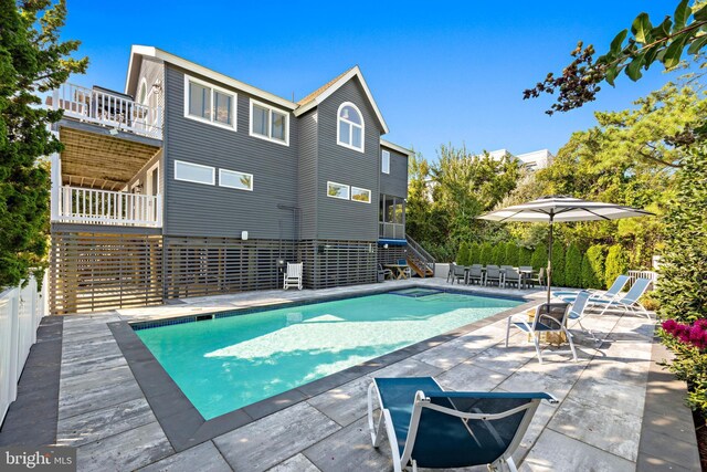 view of pool featuring a patio area