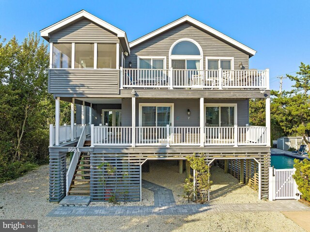 coastal inspired home with a sunroom