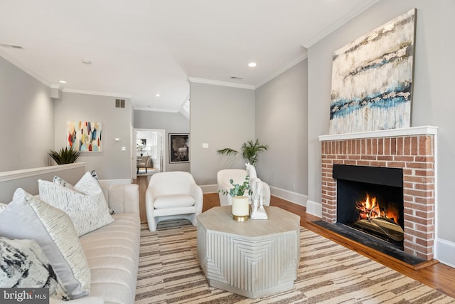 living room featuring light wood-type flooring, crown molding, a brick fireplace, and lofted ceiling