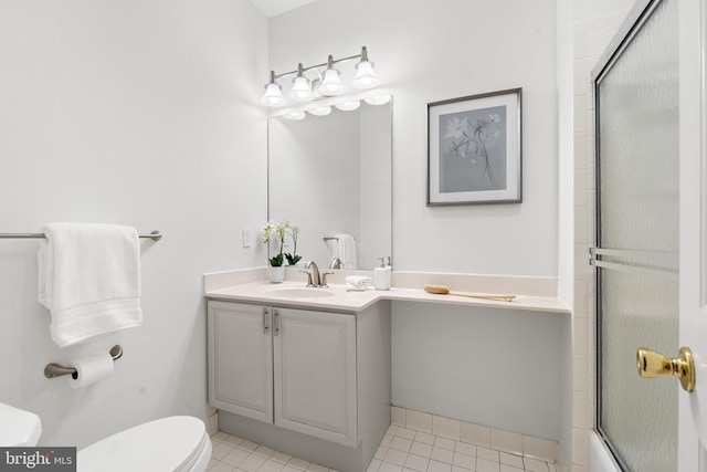 bathroom with tile patterned floors, walk in shower, toilet, and vanity