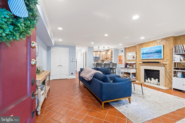 tiled living room with crown molding