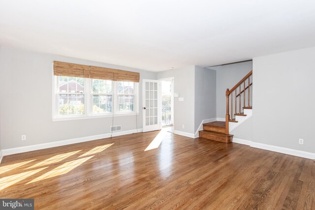 interior space with hardwood / wood-style floors