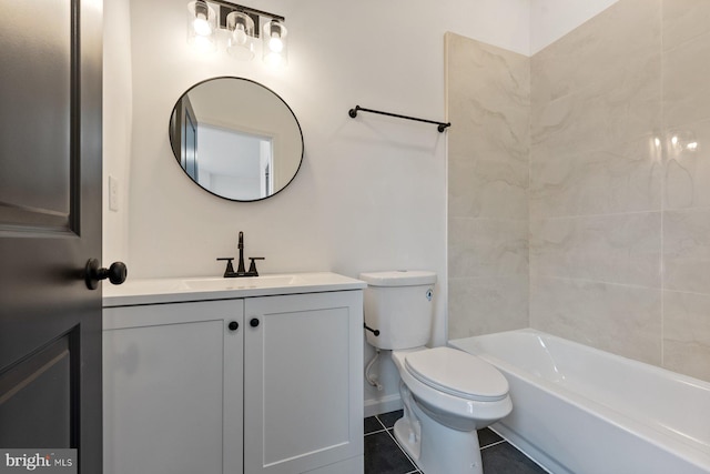 full bathroom featuring tile patterned flooring, vanity, toilet, and tiled shower / bath