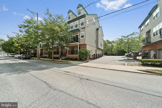 view of road featuring curbs and sidewalks