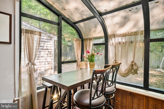 sunroom featuring plenty of natural light