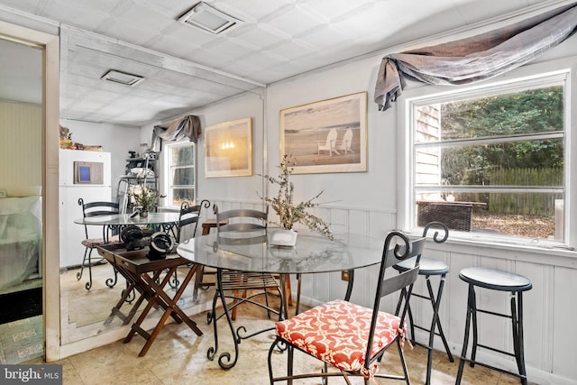 dining space with plenty of natural light