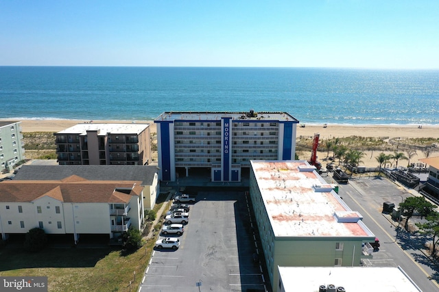 bird's eye view with a view of the beach and a water view