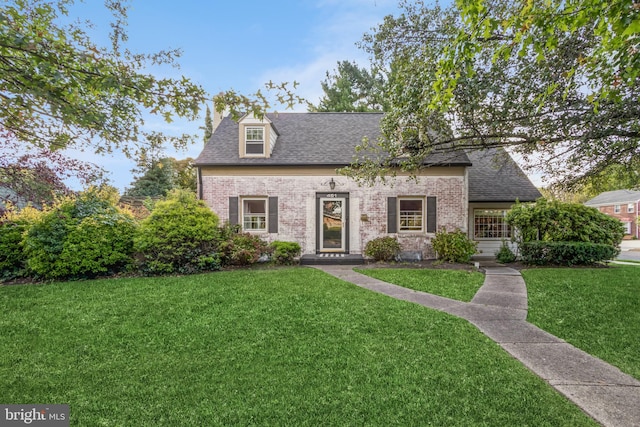 view of front of house with a front lawn