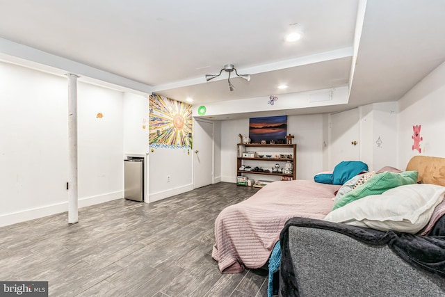 bedroom with wood-type flooring