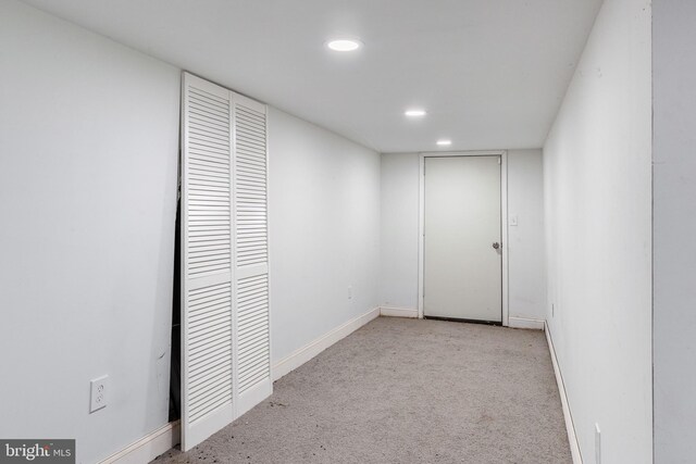 finished below grade area featuring recessed lighting, carpet flooring, and baseboards