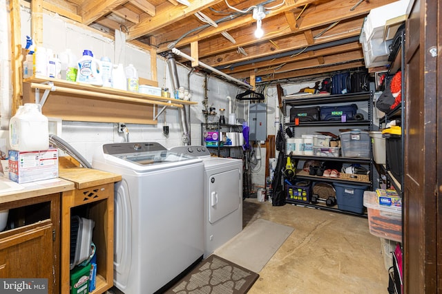 washroom with independent washer and dryer