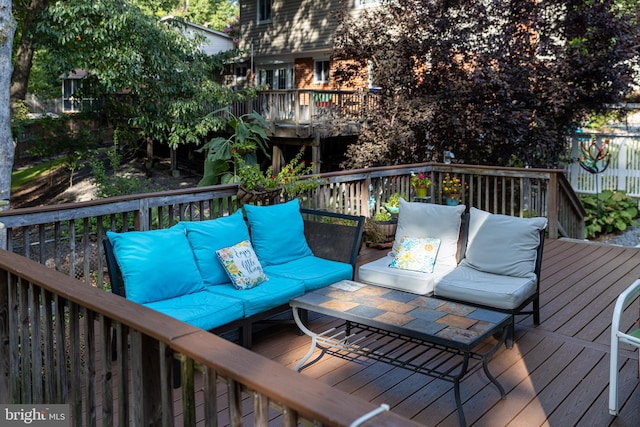 deck with an outdoor living space