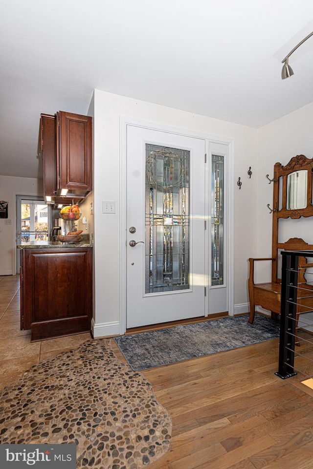 foyer entrance featuring light hardwood / wood-style flooring