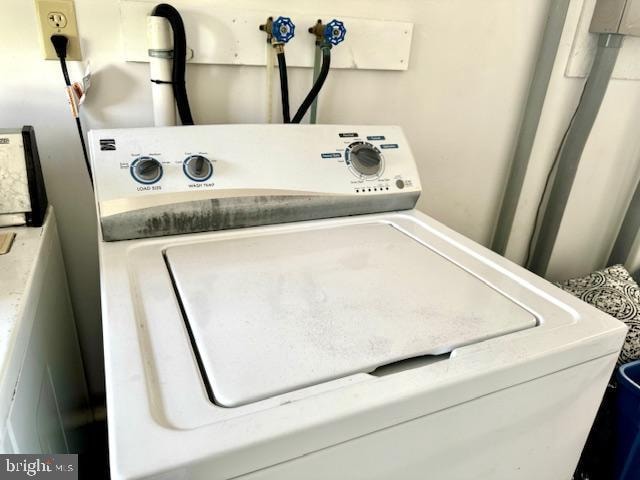 washroom featuring washer / clothes dryer