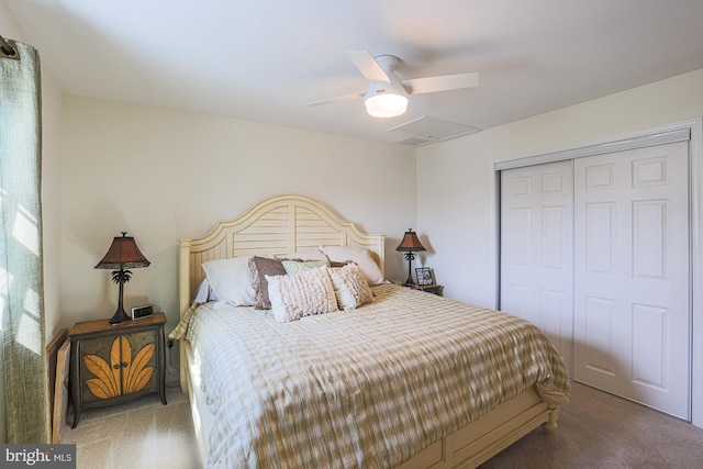 bedroom with a closet, ceiling fan, and carpet flooring