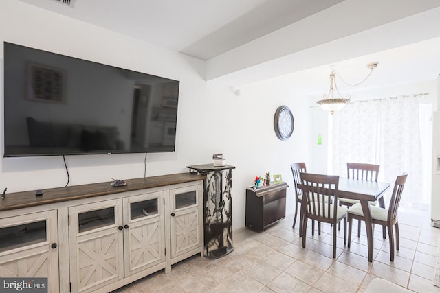 dining room with light tile patterned flooring