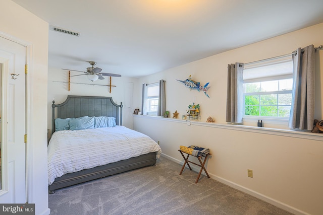 carpeted bedroom featuring ceiling fan