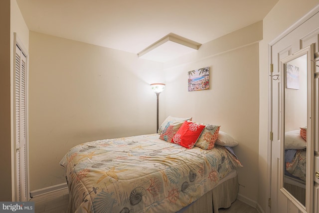 bedroom featuring a closet and hardwood / wood-style floors