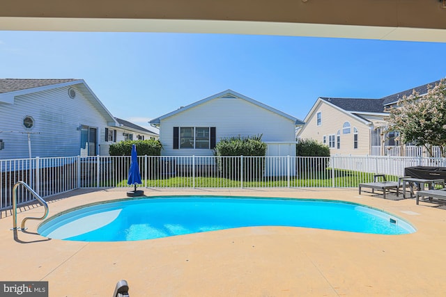 view of pool with a patio