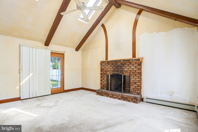 unfurnished living room with carpet, ceiling fan, a fireplace, and beam ceiling