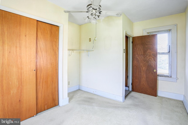 bedroom with carpet, ceiling fan, and a closet