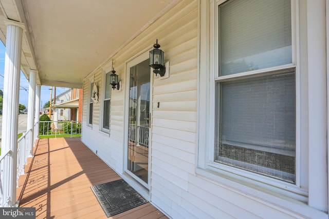 wooden deck featuring covered porch