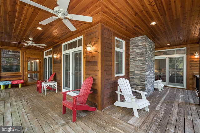 wooden deck with ceiling fan