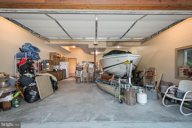 garage with white refrigerator