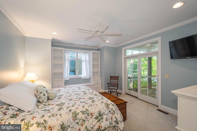 bedroom with ceiling fan, ornamental molding, access to exterior, and multiple windows