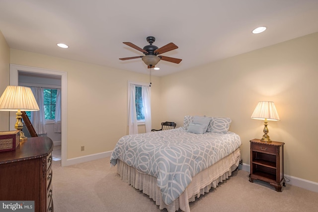 carpeted bedroom with ceiling fan