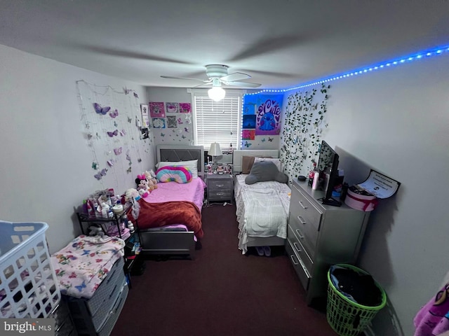 carpeted bedroom with ceiling fan